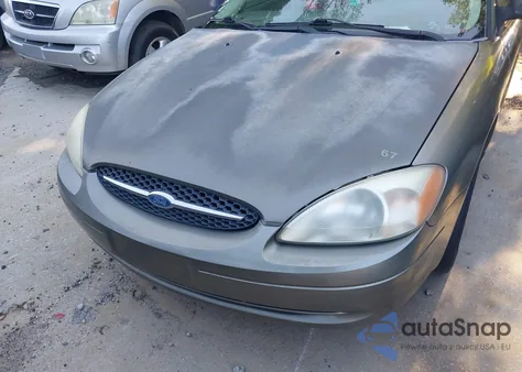 2001 Ford Taurus Lx z USA, uszkodzony, nr VIN 1FAFP52U61A207125